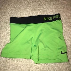 Green Nike shorts